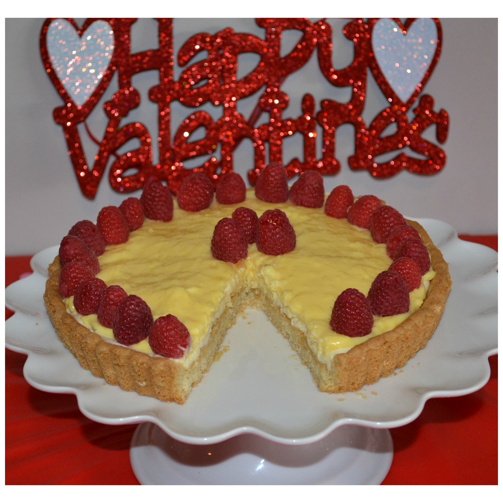 Raspberry Mascarpone Coconut Cream tart is an easy, elegant dessert to serve to your Valentine.
