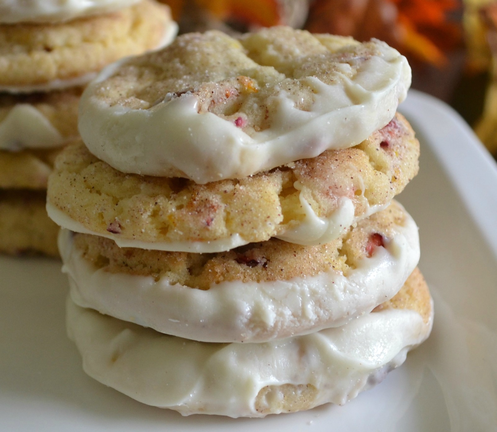 Stack of Cranberry Orange Pecan Snickerdoodle cookies on a plate