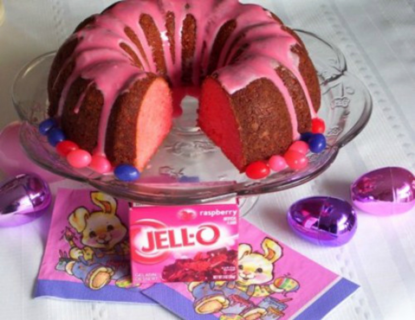 Pink Velveteen Rabbit Cake is a bundt cake flavored with Jello and garnished with Easter candy.  