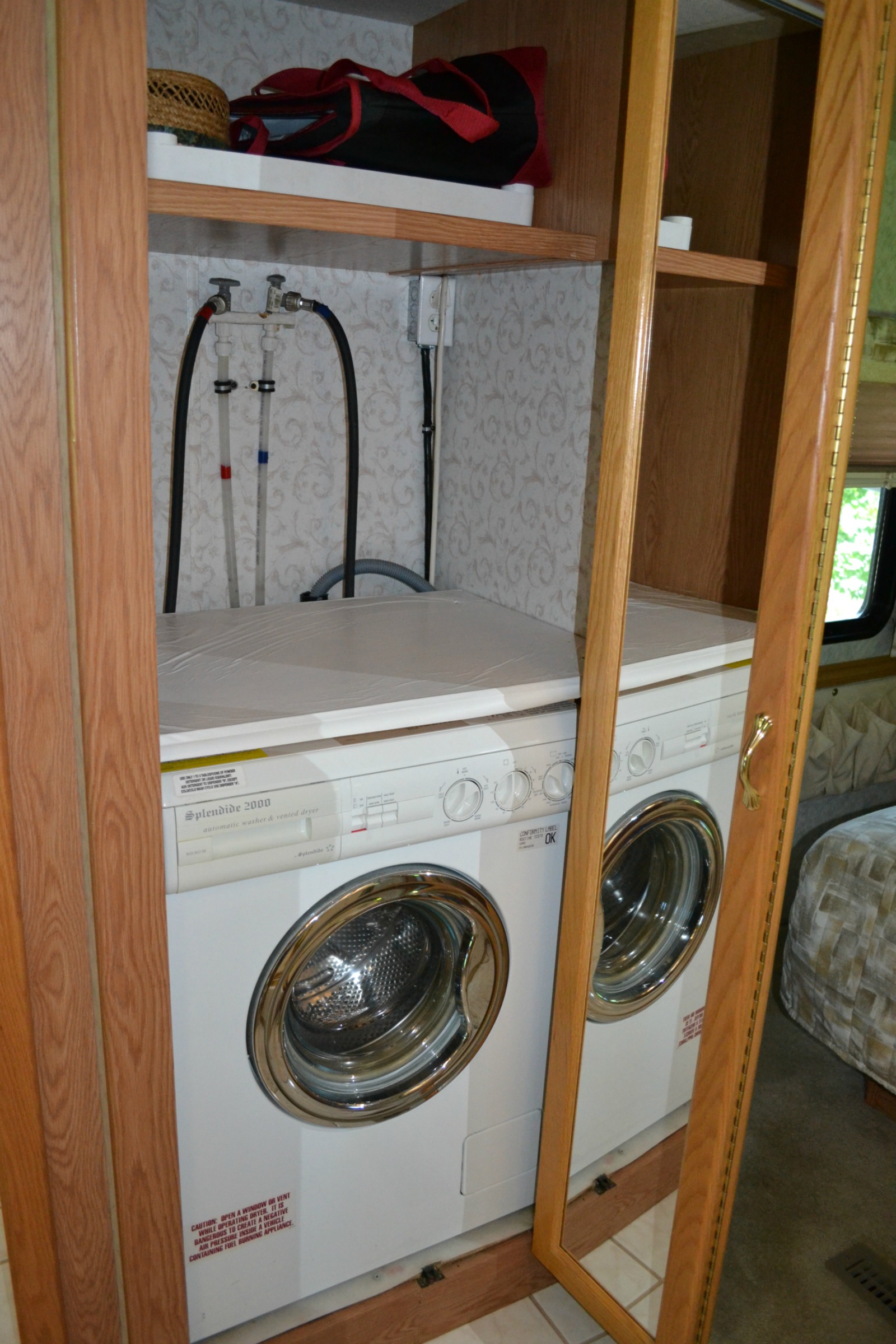 rv travel, camping, inside rv, washer and dryer in rv