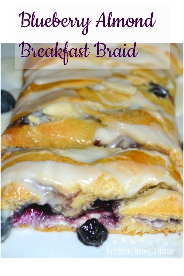 This easy breakfast braid is filled with cream cheese and blueberries then wrapped in a crescent crust. It is baked and topped with a warm, sweet glaze.