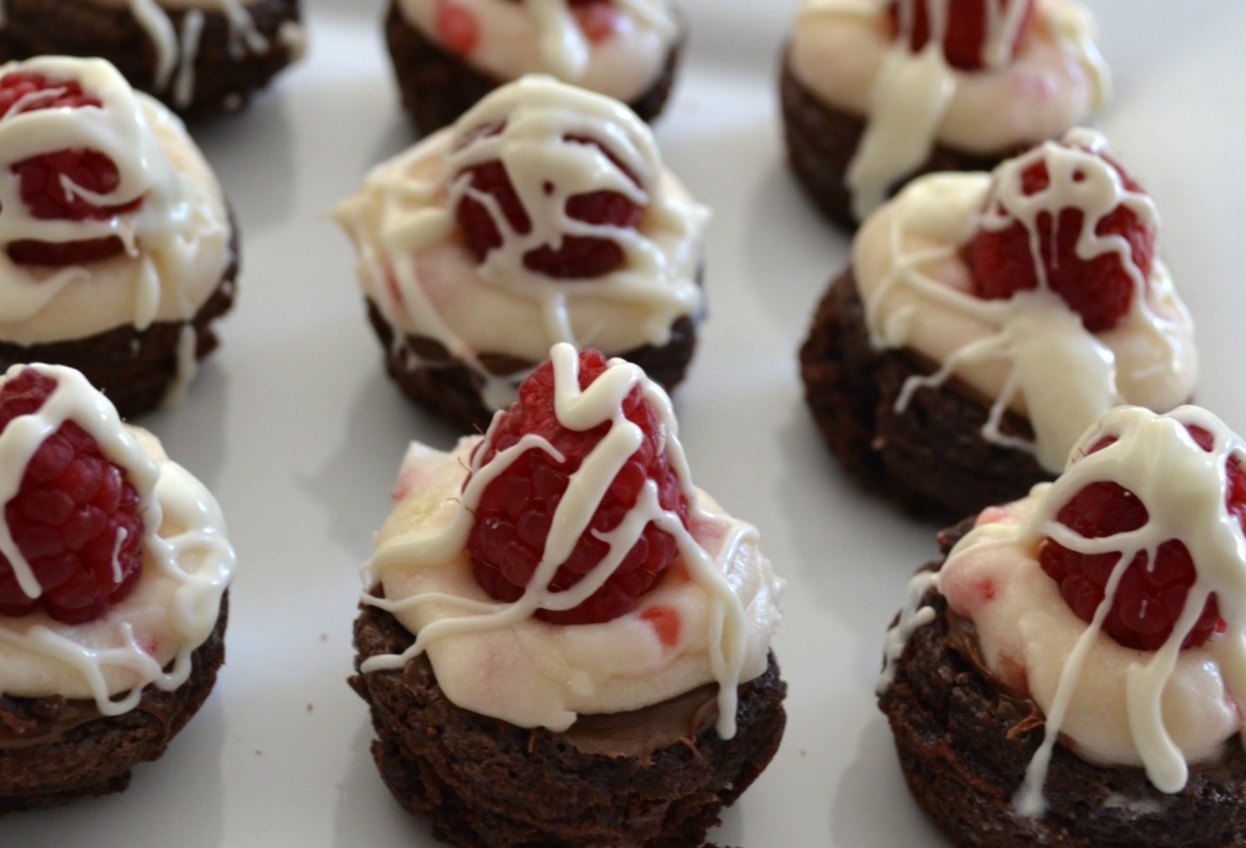 brownie bites, mascarpone cheese, raspberries