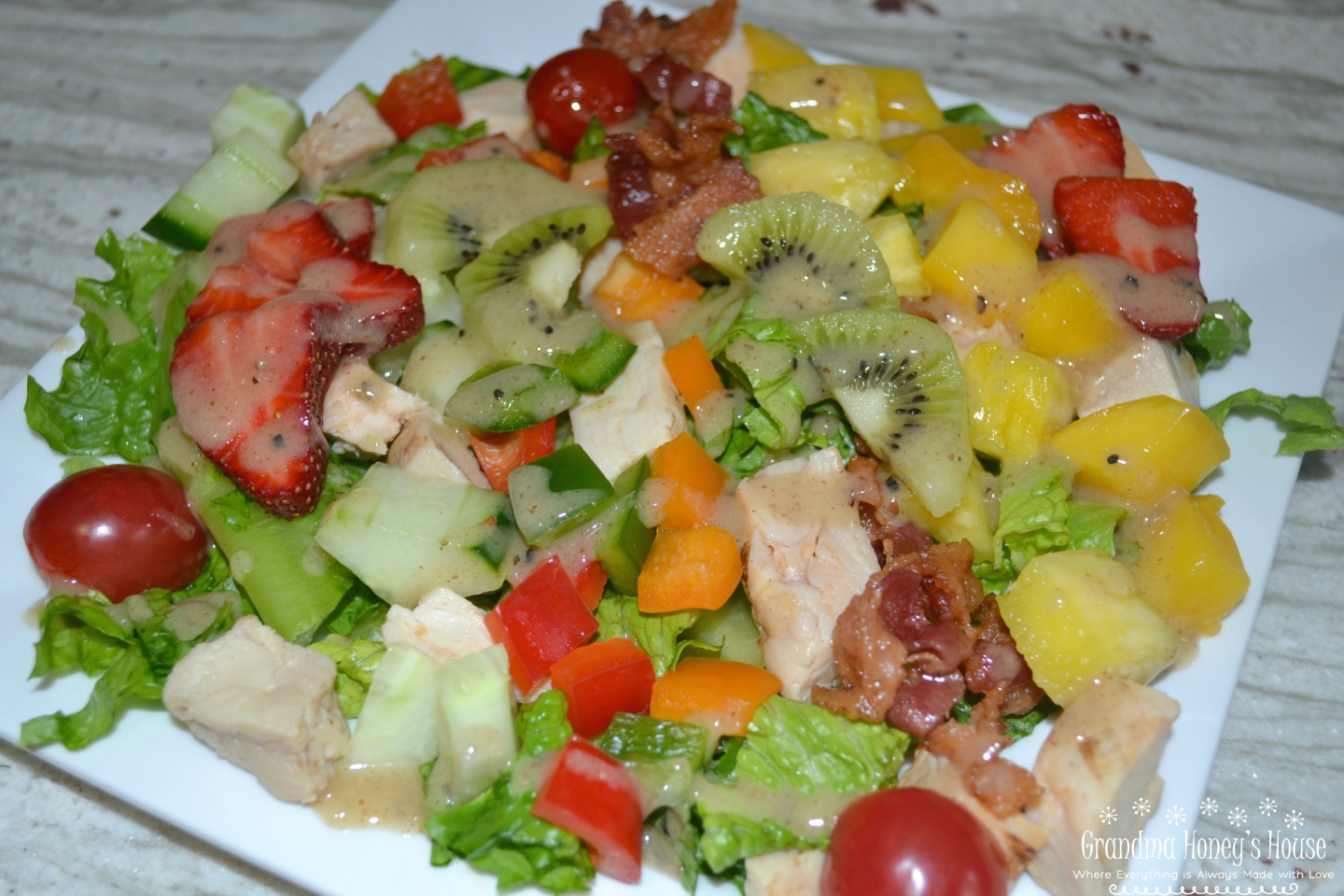 This Caribbean Chicken Cobb salad is colorful, light, and packed with lots of meat, fruits and veggies. Perfect for lunch or a light dinner.