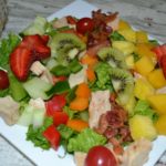 This Caribbean Chicken Cobb salad is colorful, light, and packed with lots of meat, fruits and veggies. Perfect for lunch or a light dinner.