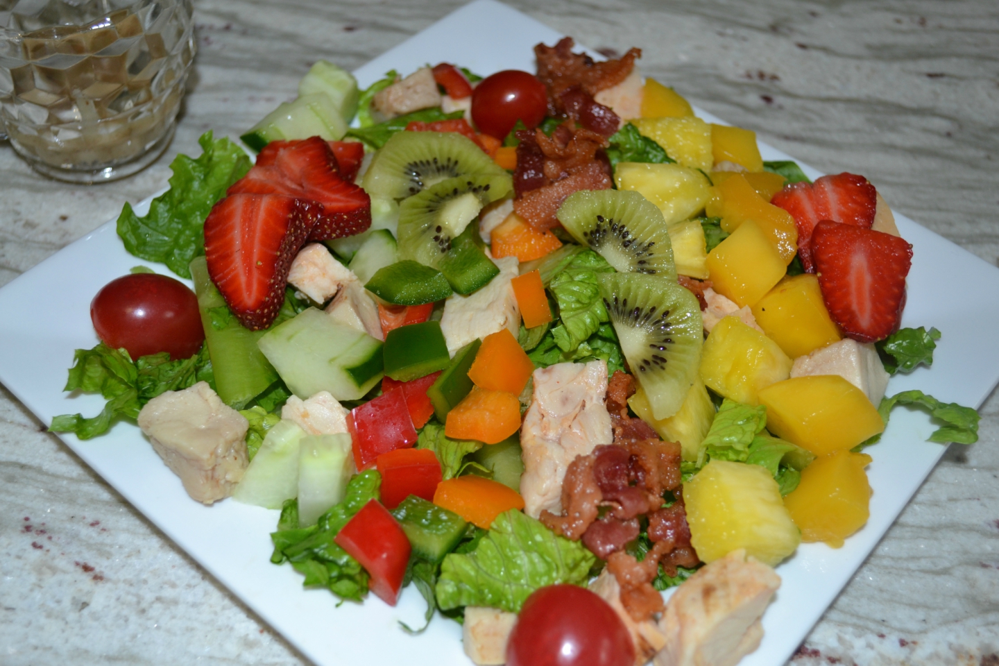 This Caribbean Chicken Cobb salad is colorful, light, and packed with lots of meat, fruits and veggies. Perfect for lunch or a light dinner.