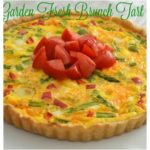 A delicious brunch tart filled with fresh veggies, eggs and cheese. Perfect way to use those summer vegetables.