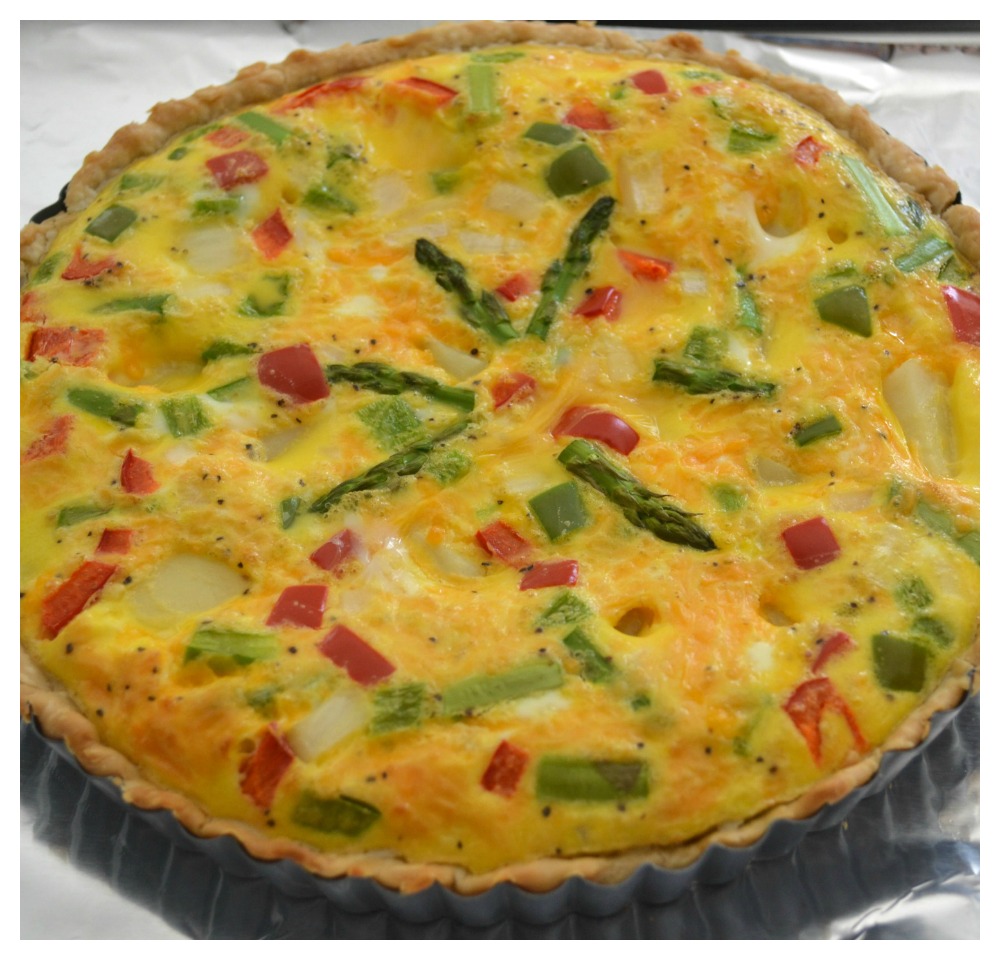 A delicious brunch tart filled with fresh veggies, eggs and cheese. Perfect way to use those summer vegetables.