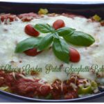 Cheesy Garden Patch Spaghetti bake is loaded with veggies, sauce, pasta and cheese.