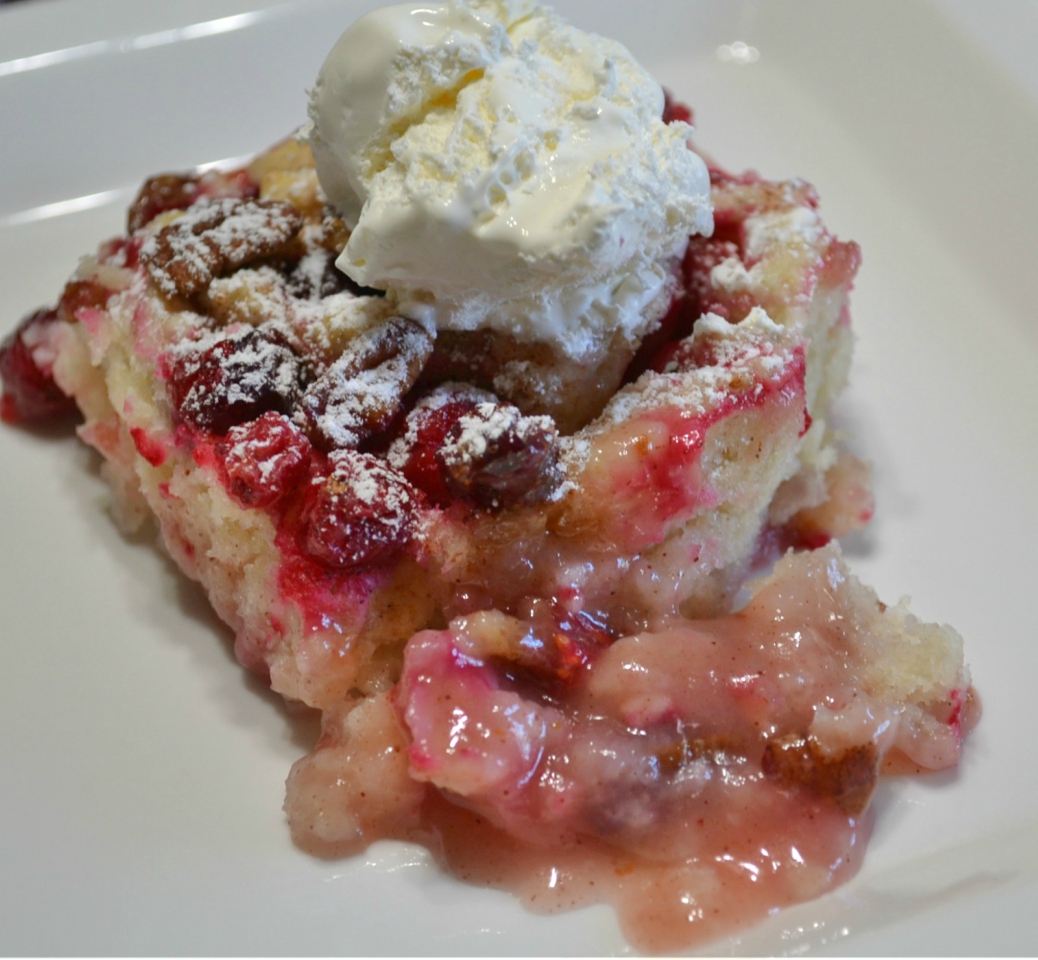 A rustic cranberry-orange-pecan cobbler roll that is perfect to serve as a Thanksgiving dessert.