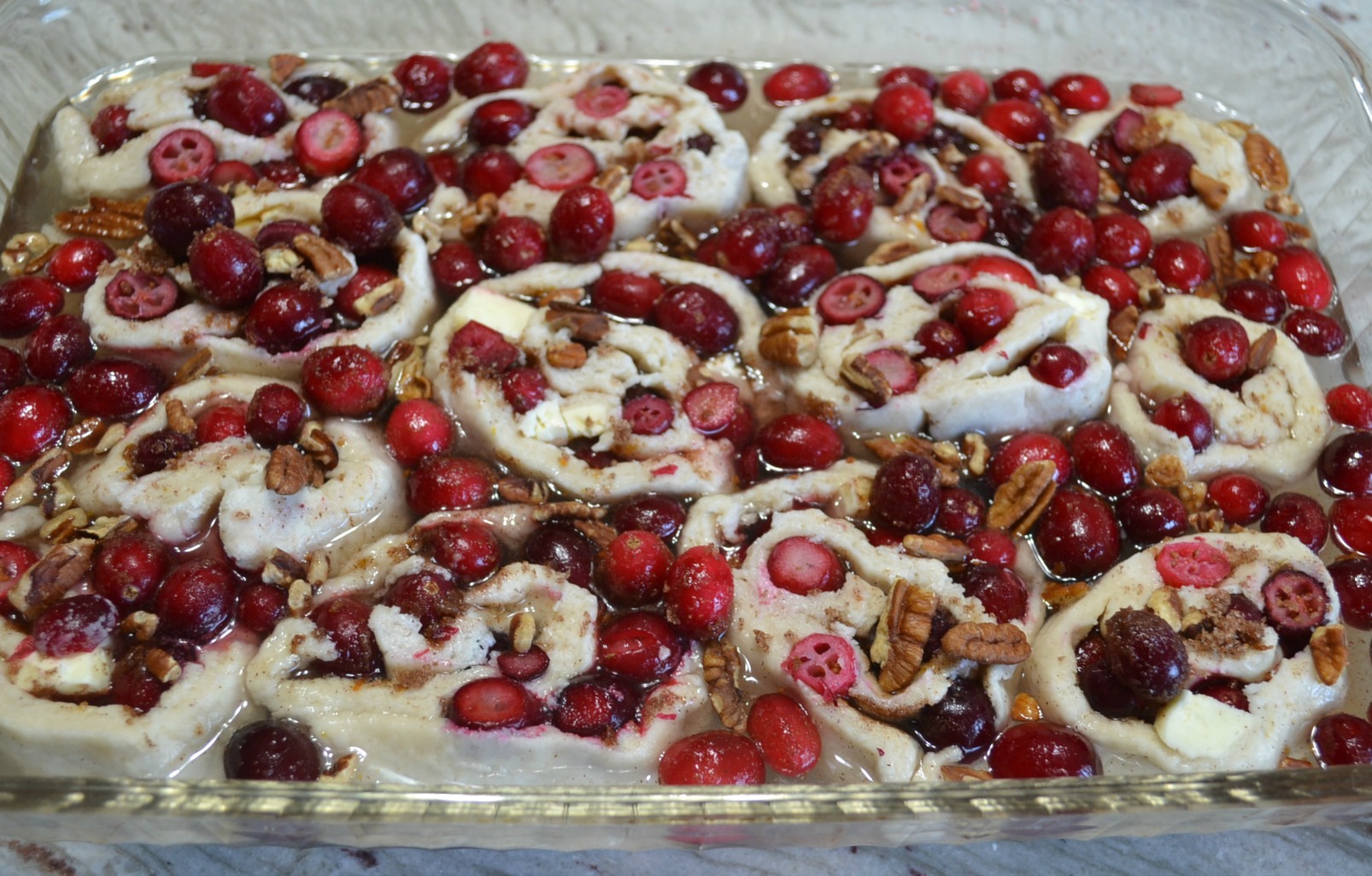 A rustic cranberry-orange-pecan cobbler roll that is perfect to serve as a Thanksgiving dessert.