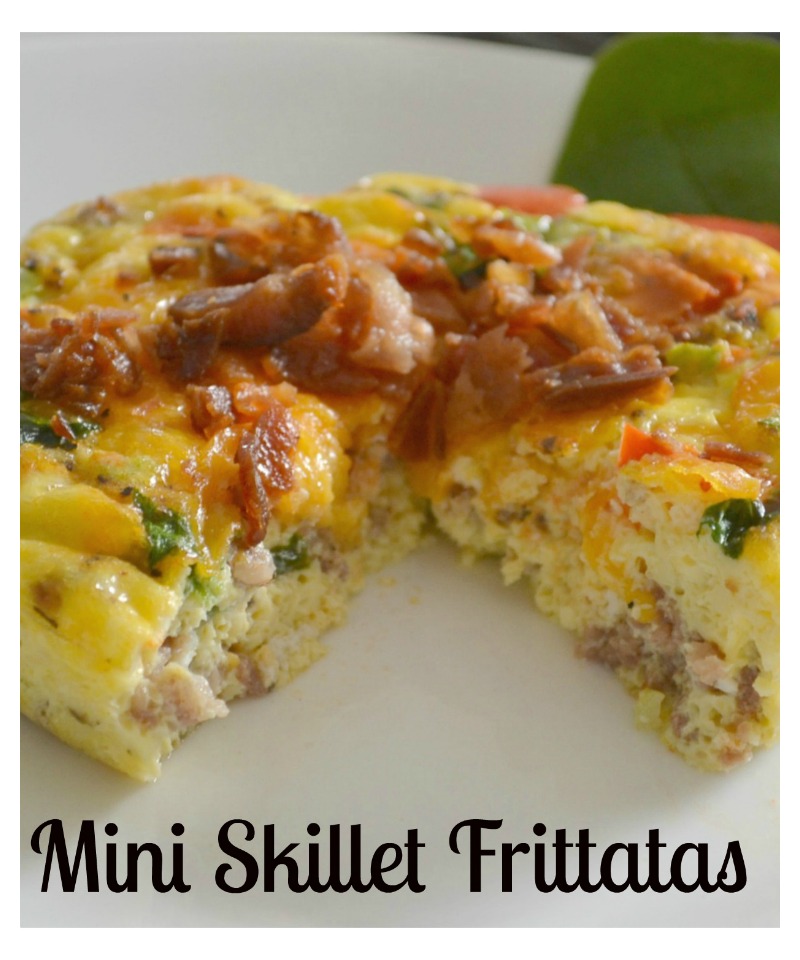 Mini Frittatas loaded with bacon ham, sausage, eggs, cheese, and veggies baked in a mini cast iron skillet.