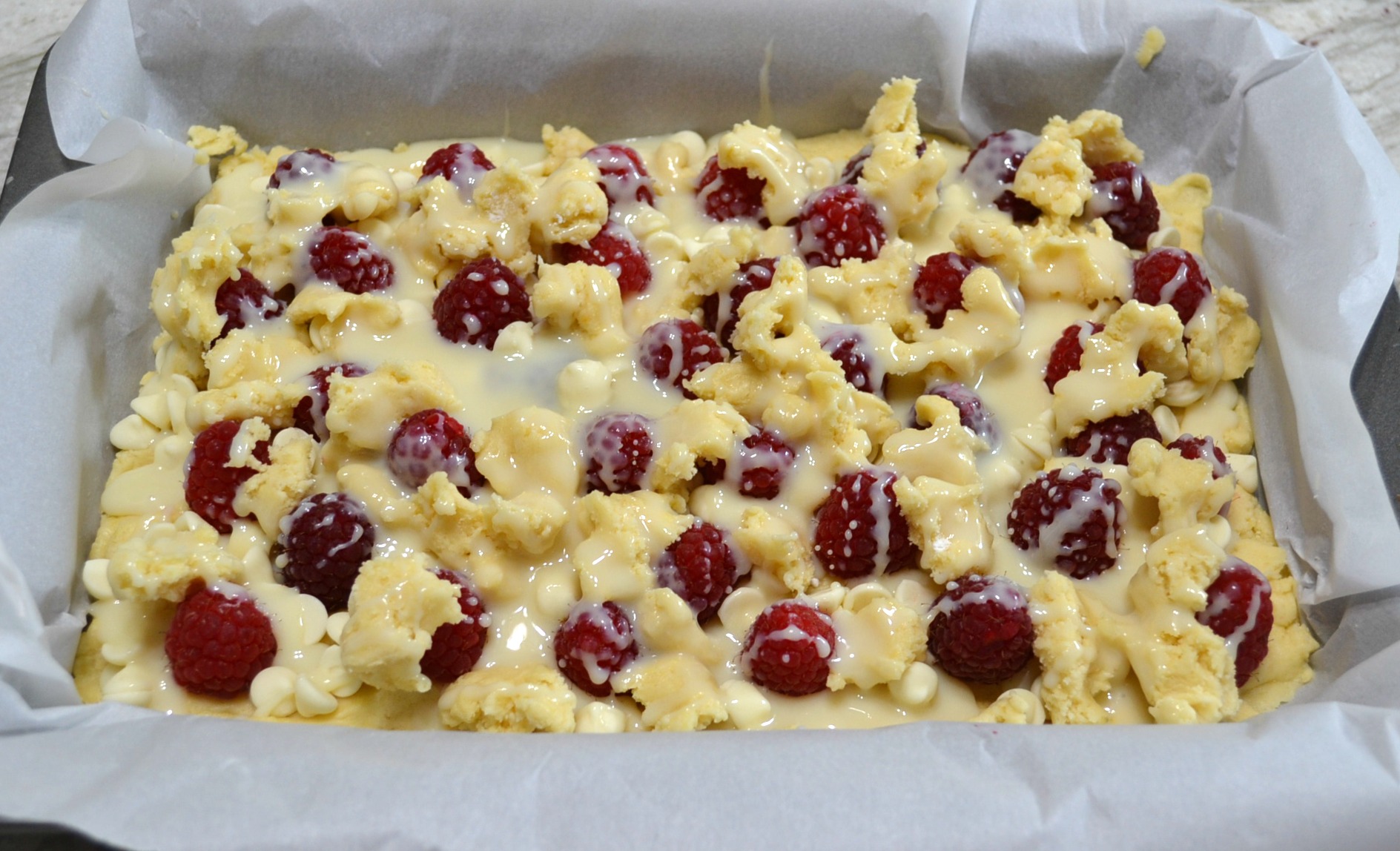 Raspberry White Chocolate Cake Bars are an easy to make, decadent dessert.