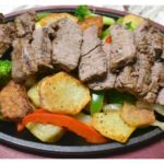 Sizzlin Steak and garlic roasted potato skillets are a delicious twist on a steak and potato dinner