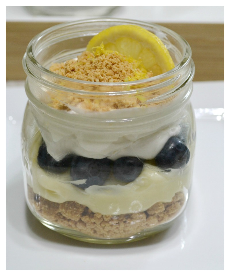 Meyer lemon whipped pudding, blueberries, and mascarpone cheese in a jar is the perfect summertime dessert.