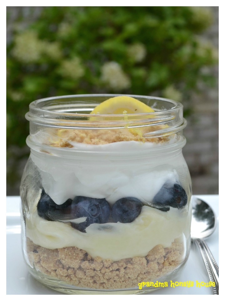 Meyer lemon whipped pudding, blueberries, and mascarpone cheese in a jar is the perfect summertime dessert.