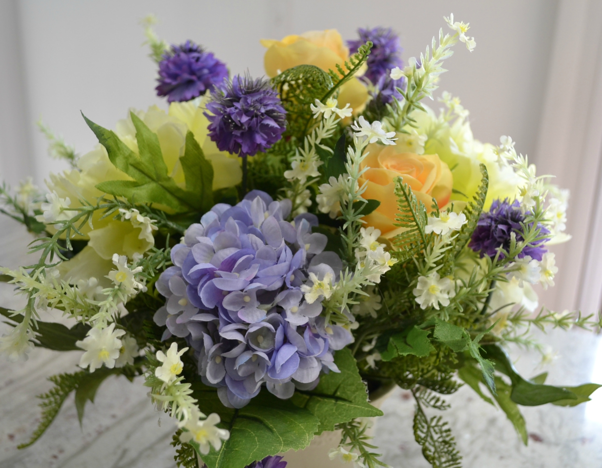 Review of a beautiful arrangement of colorful, silk flowers from Commercial Silk Int'l.