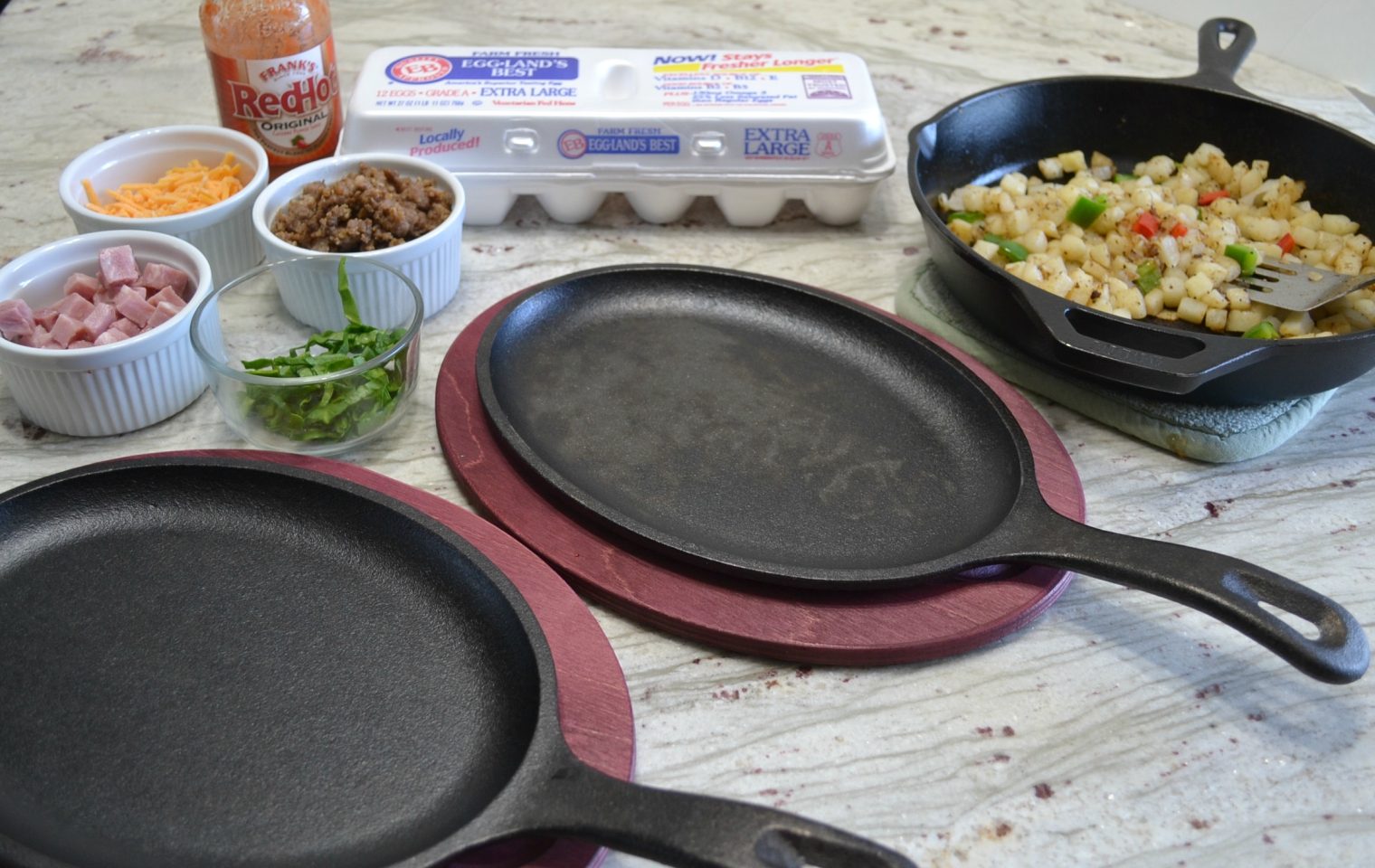 St. Patrick's Day breakfast skillets packed with eggs, meats, veggies, and cheese.
