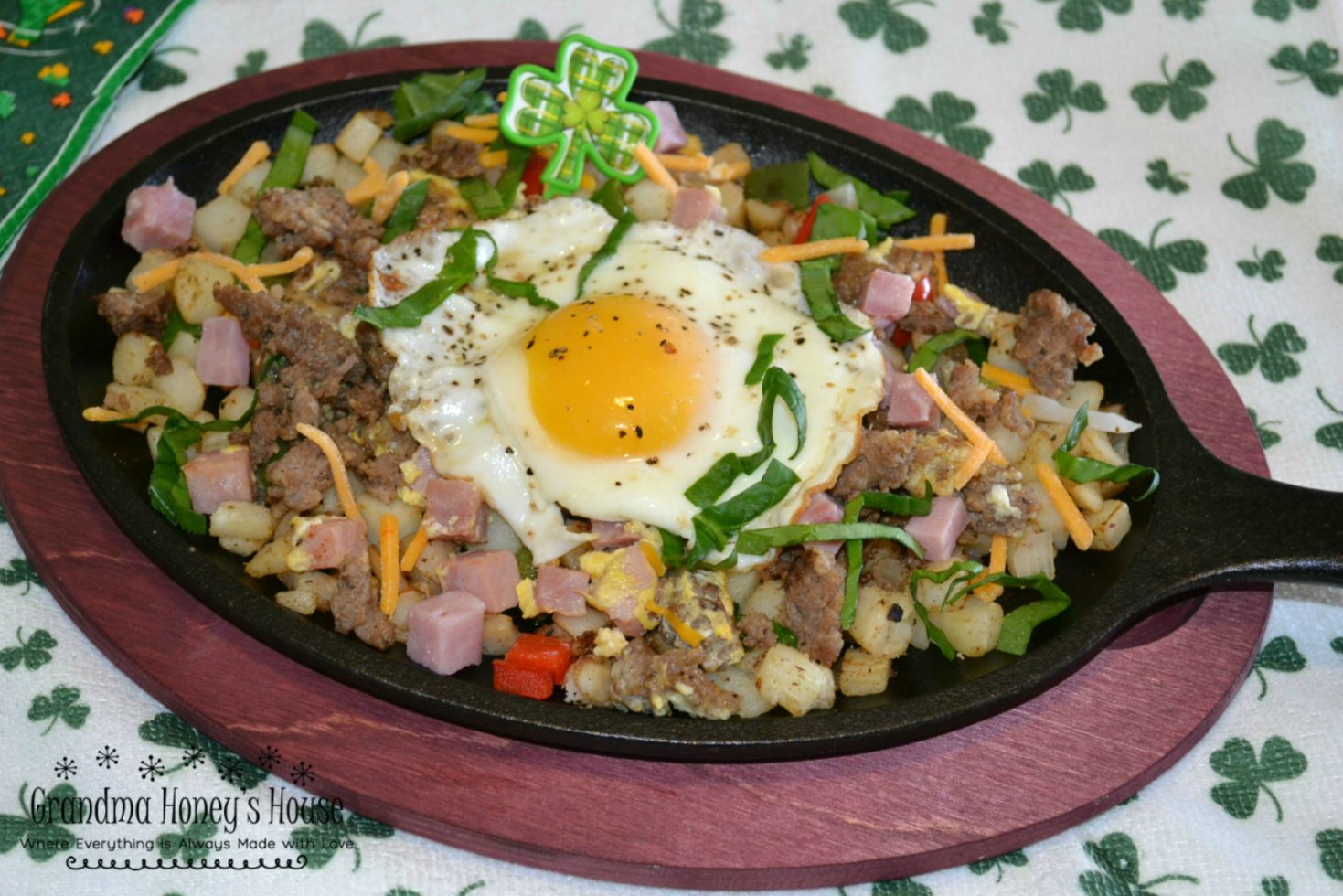 St. Patrick's Day Sizzlin breakfast skillets are packed with eggs, meats, veggies, and cheese.