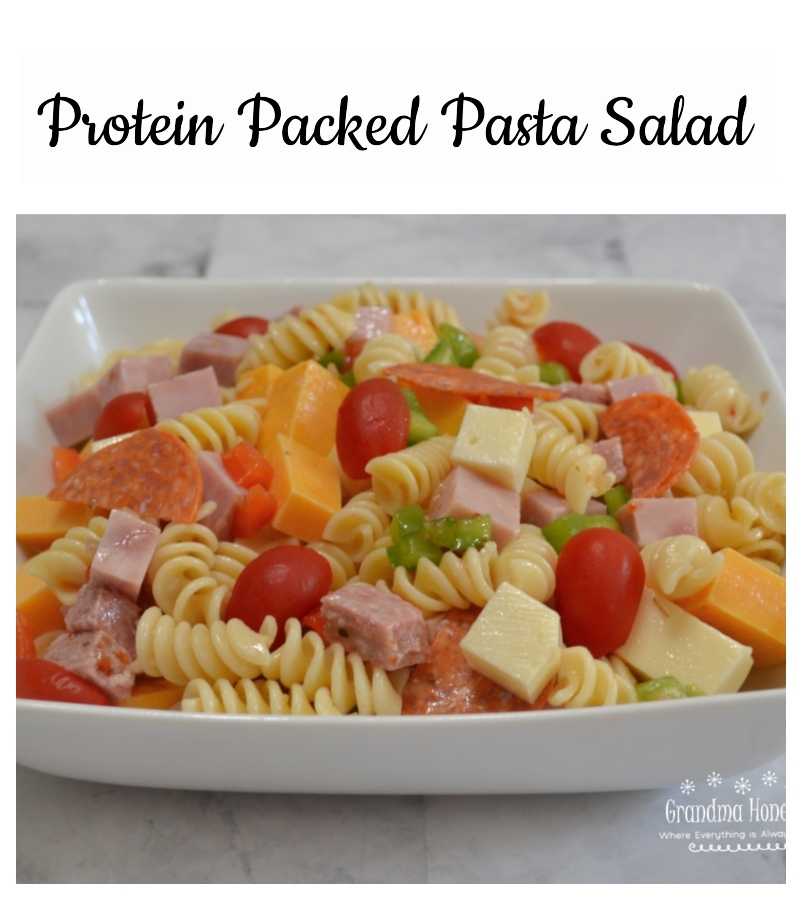 This Protein Packed Pasta Salad is loaded with veggies, meats, and cheeses. Colorful, delicious, and perfect to transport to any summer event.