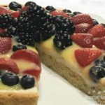 Berry Lemon Mascarpone Cookie Tart is made with a sugar cookie crust that is filled with sweetened mascarpone cheese, lemon curd, and topped with fresh berries.