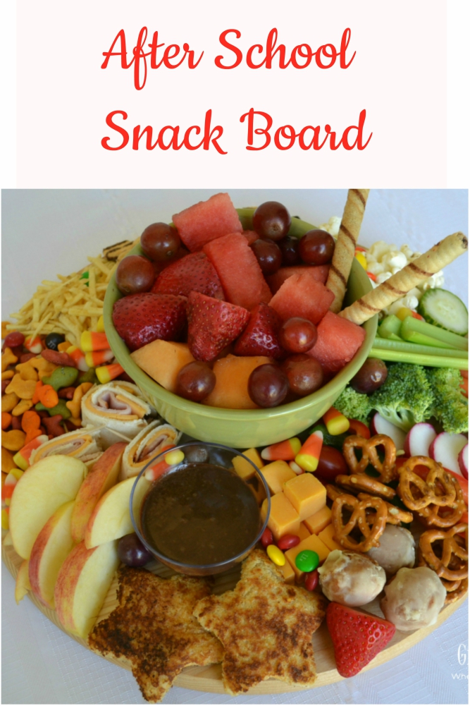 This After School Snack Board is a fun collection of treats for your kids. The board is packed with fruits, veggies, cheese, and sweet treats.