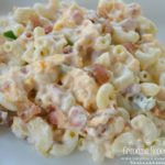 Pimento Bacon Macaroni Salad is the perfect southern style dish with a pimento cheese base, bacon, and a touch of heat from the jalapenos.