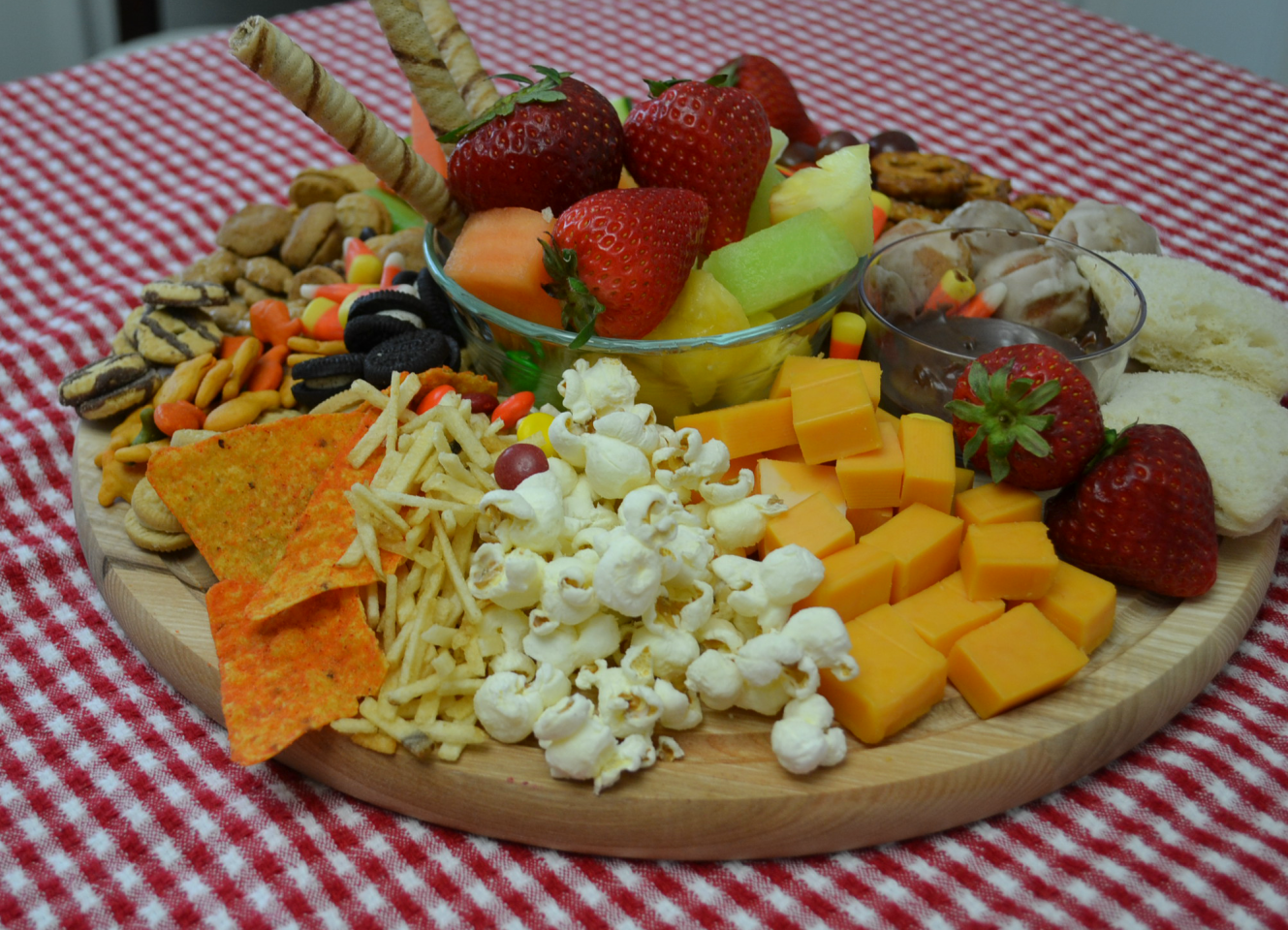 This After School Snack Board is a fun collection of treats for your kids. The board is packed with fruits, veggies, cheese, and sweet treats. 