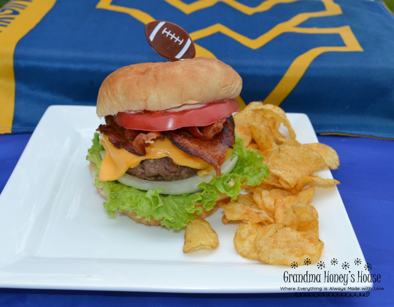 The WV Mountaineer Burger was created to honor the WVU football team and the state of WV. Perfect for tailgates. Loaded with beef, cheese and condiments.