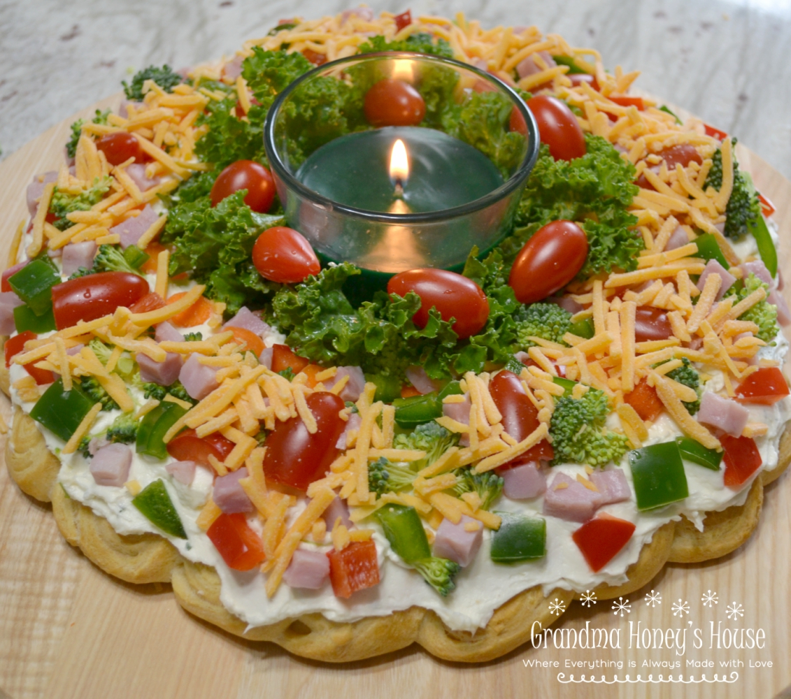 This Christmas Crescent Appetizer Wreath is a festive spin on a veggie pizza.