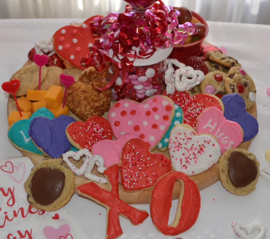 This Valentine's Day Treat Board is filled with sweet and savory treats. Perfect for any party