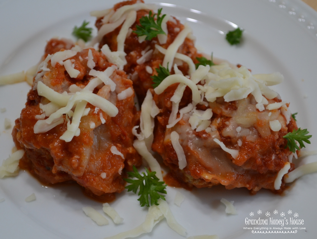 Cheesy Chicken Meatballs are moist, packed with flavor,cheese, and baked in pasta sauce.