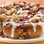 A prize winning recipe for brunch. Refrigerated biscuits filled with mascarpone cheese, rolled in butter, cinnamon and sugar. Cranberries and walnuts added, baked and then drizzled with a mascarpone glaze.