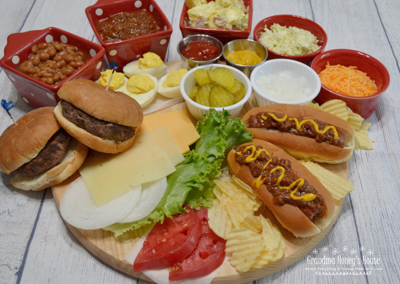 Easy Meals Served on a Board are all the rage. They are colorful and creative. This burger/hot dog board with sides is perfect for 2. 