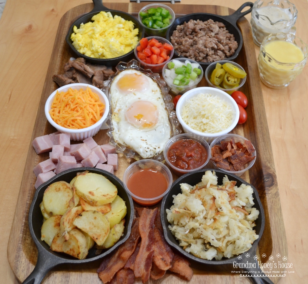 Country Breakfast Bowl Board is loaded with meats,veggies,eggs,toppings,cheeses,and sauces. 