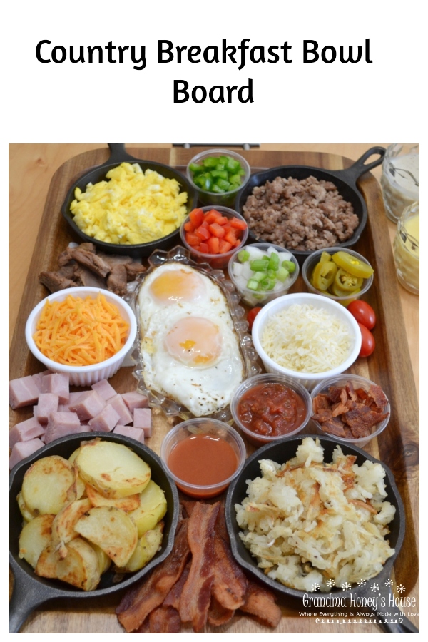 Country Breakfast Bowl Board is loaded with meats,veggies,eggs,toppings,cheeses,and sauces. 