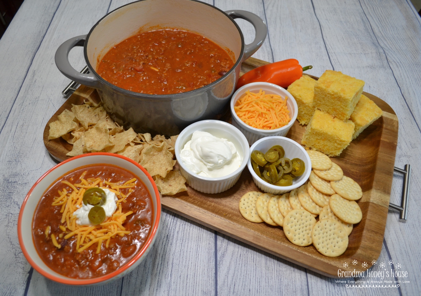 Spicy Beef and 3 bean chili is the ultimate pot of chili. Beef, beans, spices, veggies and tomato juice slow simmered to perfection.