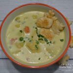 Chicken Pot Pie Soup loaded with chicken,veggies,a creamy broth and topped with herb flavored pie crust toppers.