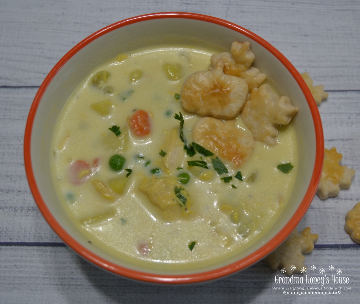 Chicken Pot Pie Soup loaded with chicken,veggies,a creamy broth and topped with herb flavored pie crust toppers.