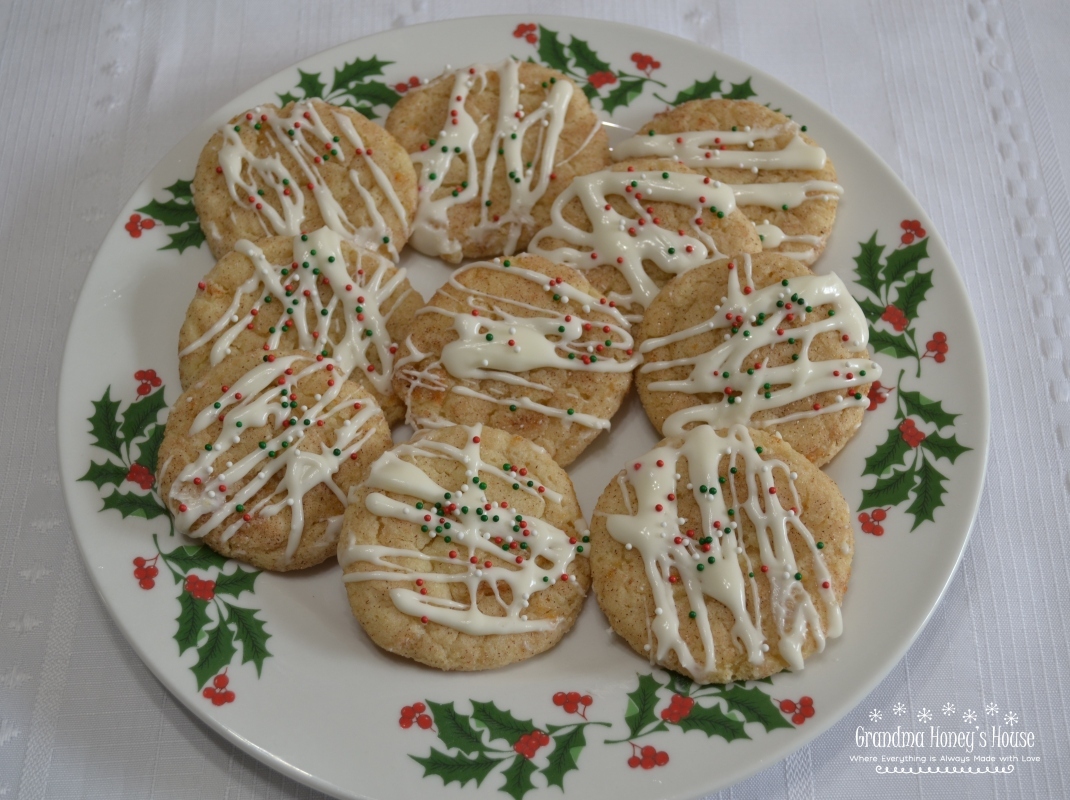 Sugar Plum Dreams are a  soft butter cookie infused with the unique flavor of Fiori Di Sicilia extract and cooked plums, then rolled in cinnamon sugar and baked. Add a drizzle