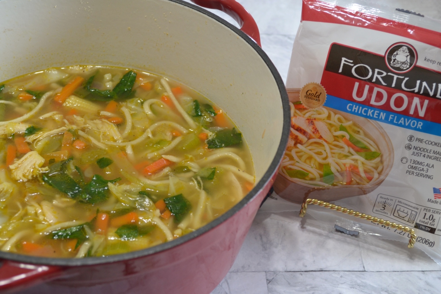 Oriental Chicken Udon Noodle Soup is a warm bowl of rich, seasoned broth, loaded with rotisserie chicken, asian style vegetables and delicious Fortune Chicken Flavored Udon Noodles