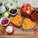 Valentine's Day Mini Breakfast Quiche and other foods create this beautiful board to share with your love.