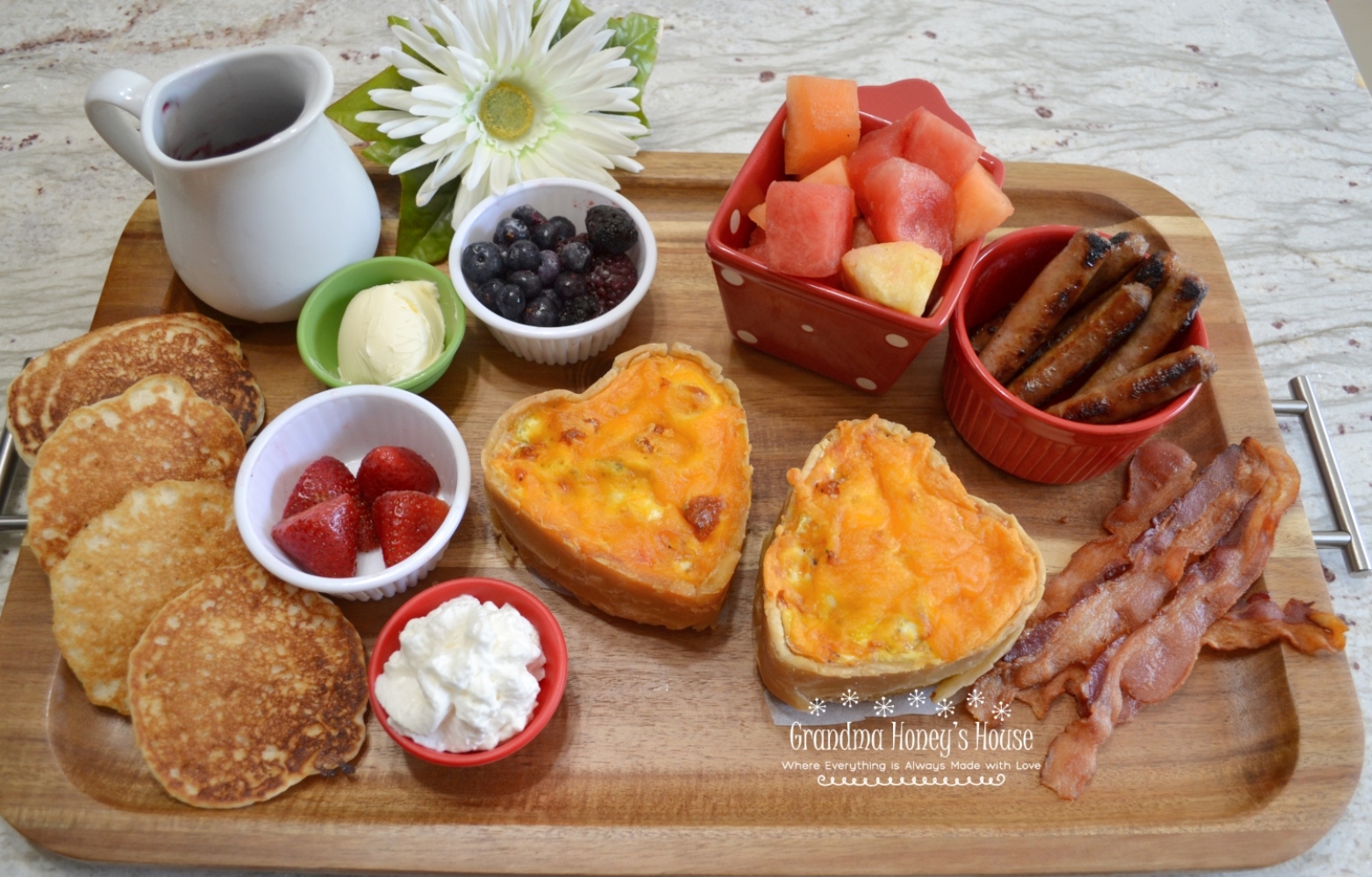 Valentine's Day Mini Breakfast Quiche and other foods create this beautiful board to share with your love.