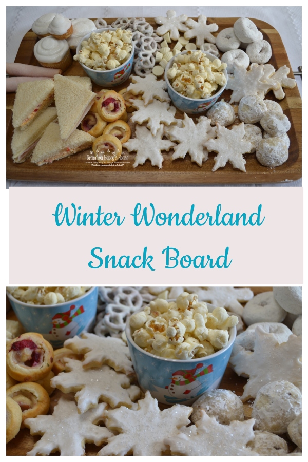 A Winter Wonderland Snack Board filled with savory and sweet, white treats to enjoy on a snowy day. 