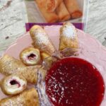 Raspberry Almond Cream Egg rolls with Raspberry Dipping Sauce are an elegant holiday appetizer