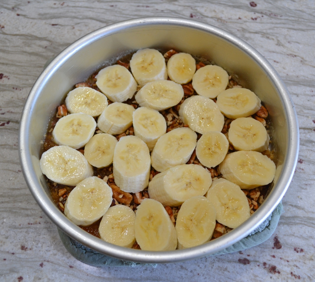 Caramel Banana-Nut Breakfast Rolls A pan of sticky, pull-apart rolls made with refrigerated biscuits, bananas, butter, brown sugar, nuts, and  drizzled with caramel topping.