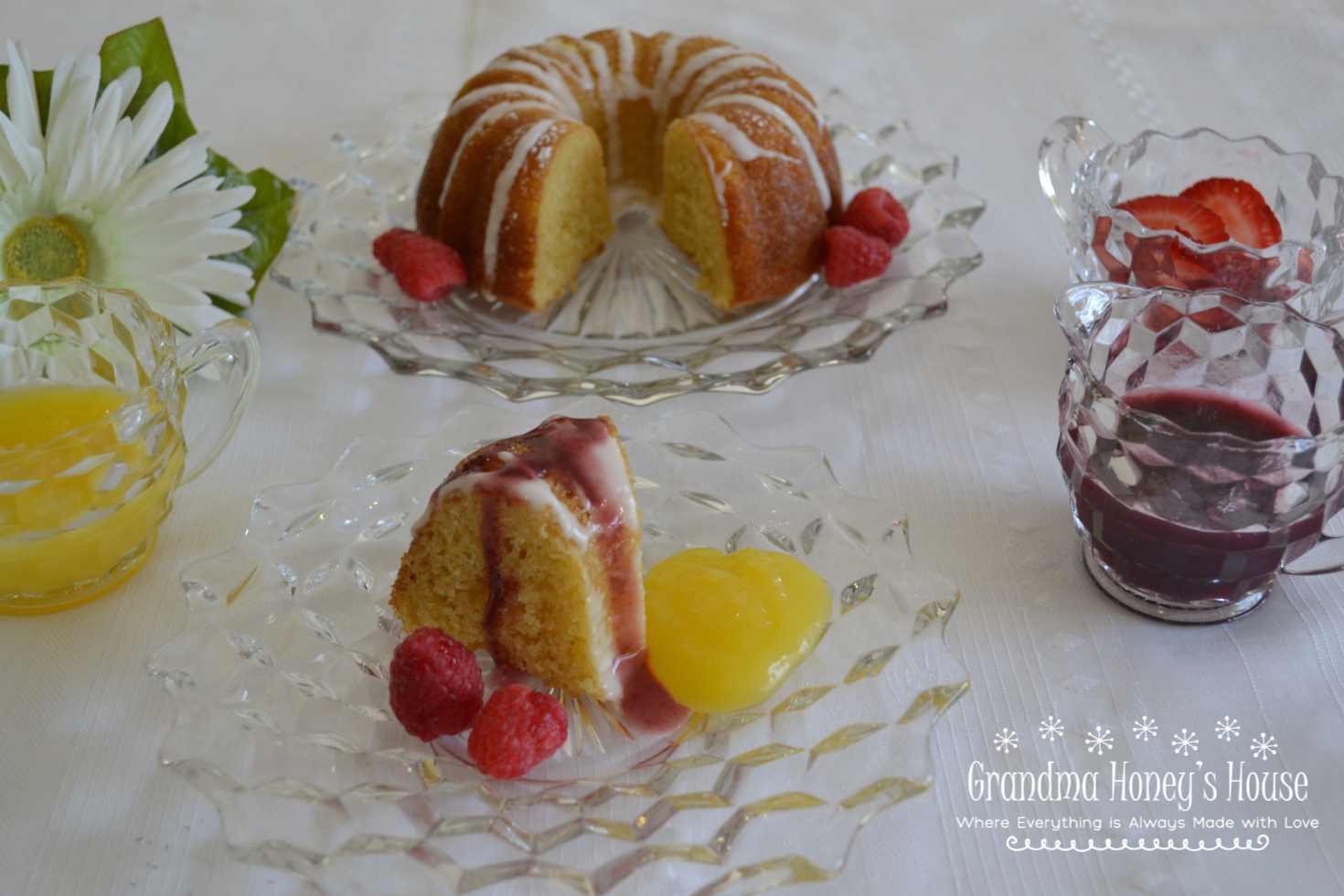 Mini Citrus Bundt Cake with Lemon Curd and Raspberry Sauce, an elegant, small dessert with big flavor.