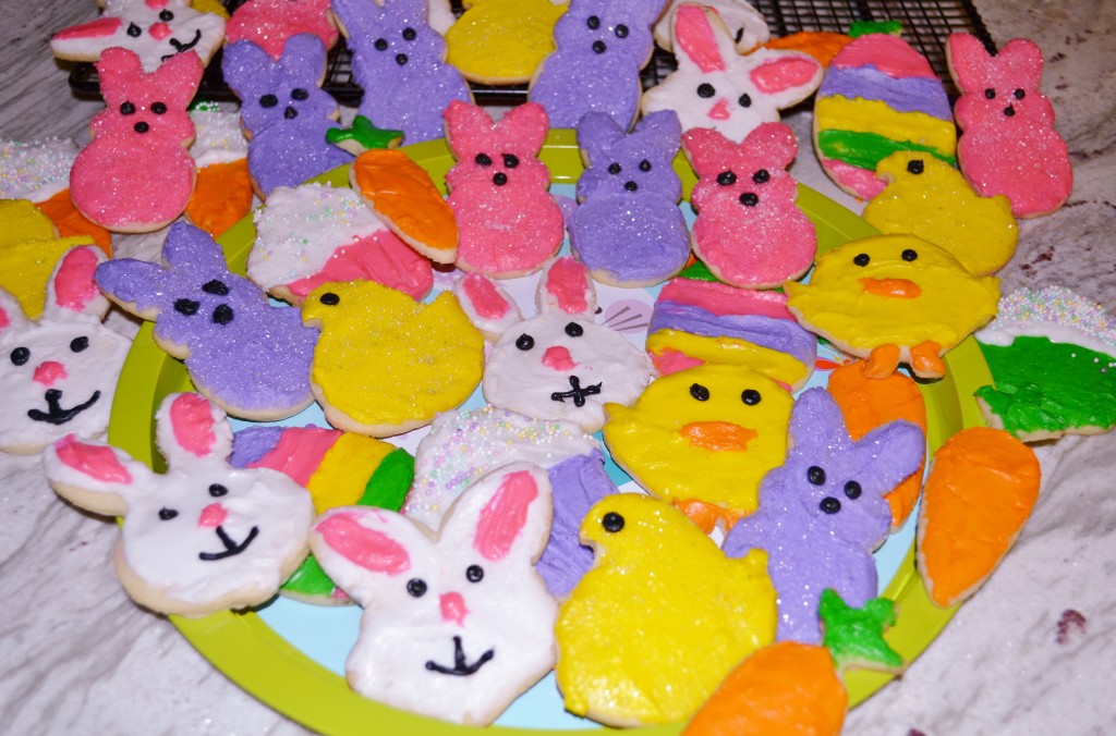 Easter treats to make with your children. Decorated sugar cookies candy bags, cupcakes