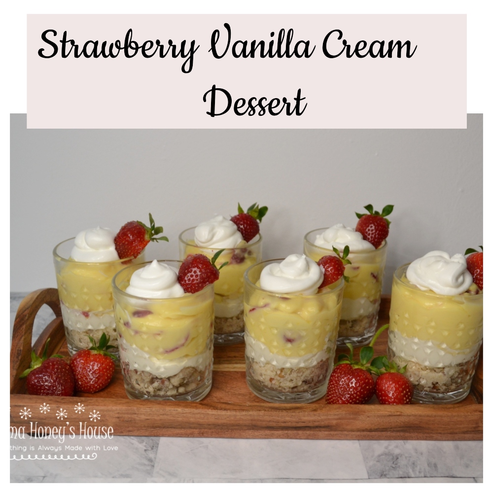 Strawberry Vanilla Cream Dessert, layers with pecan crust, cream cheese, pudding, fresh strawberries and whipped topping. 