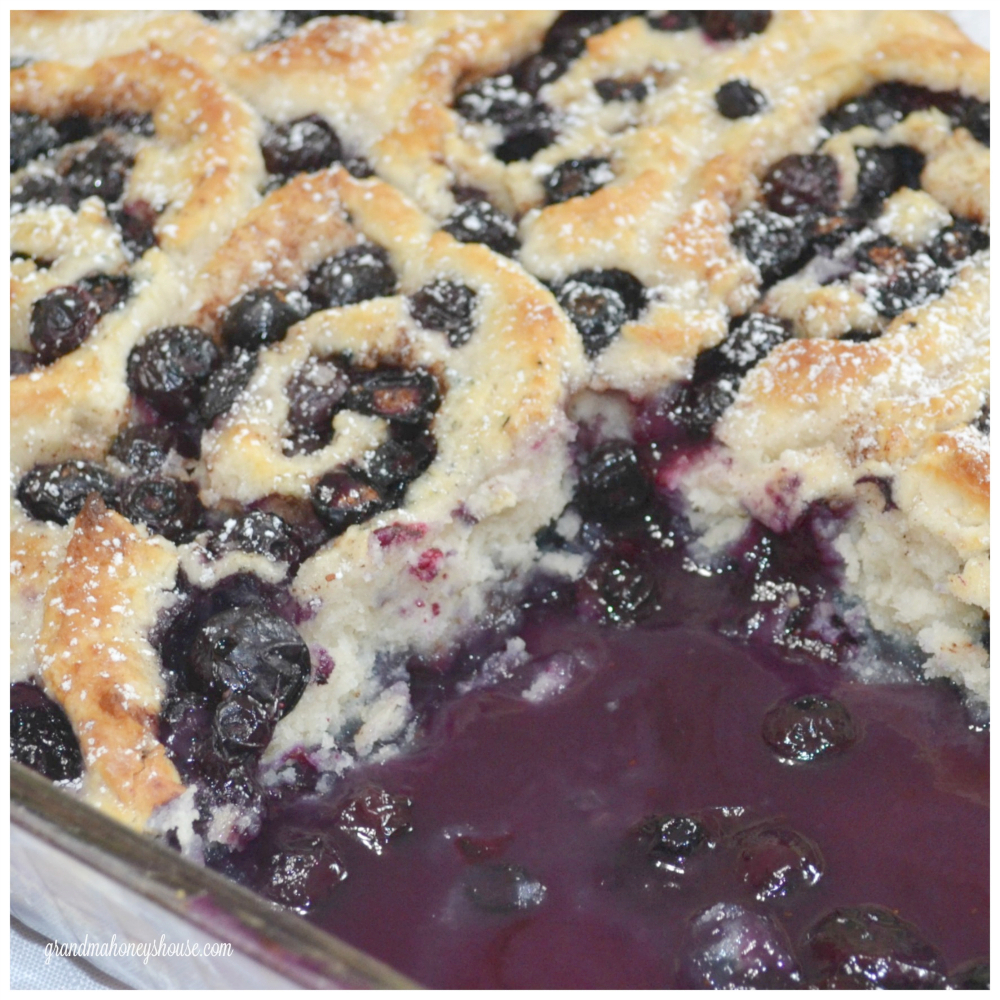 Rustic blueberry cobbler roll. made with a soft, shortcake-style dough, fresh blueberries, and baked in a rich homemade syrup, every bite is warm, comforting, and absolutely irresistible.