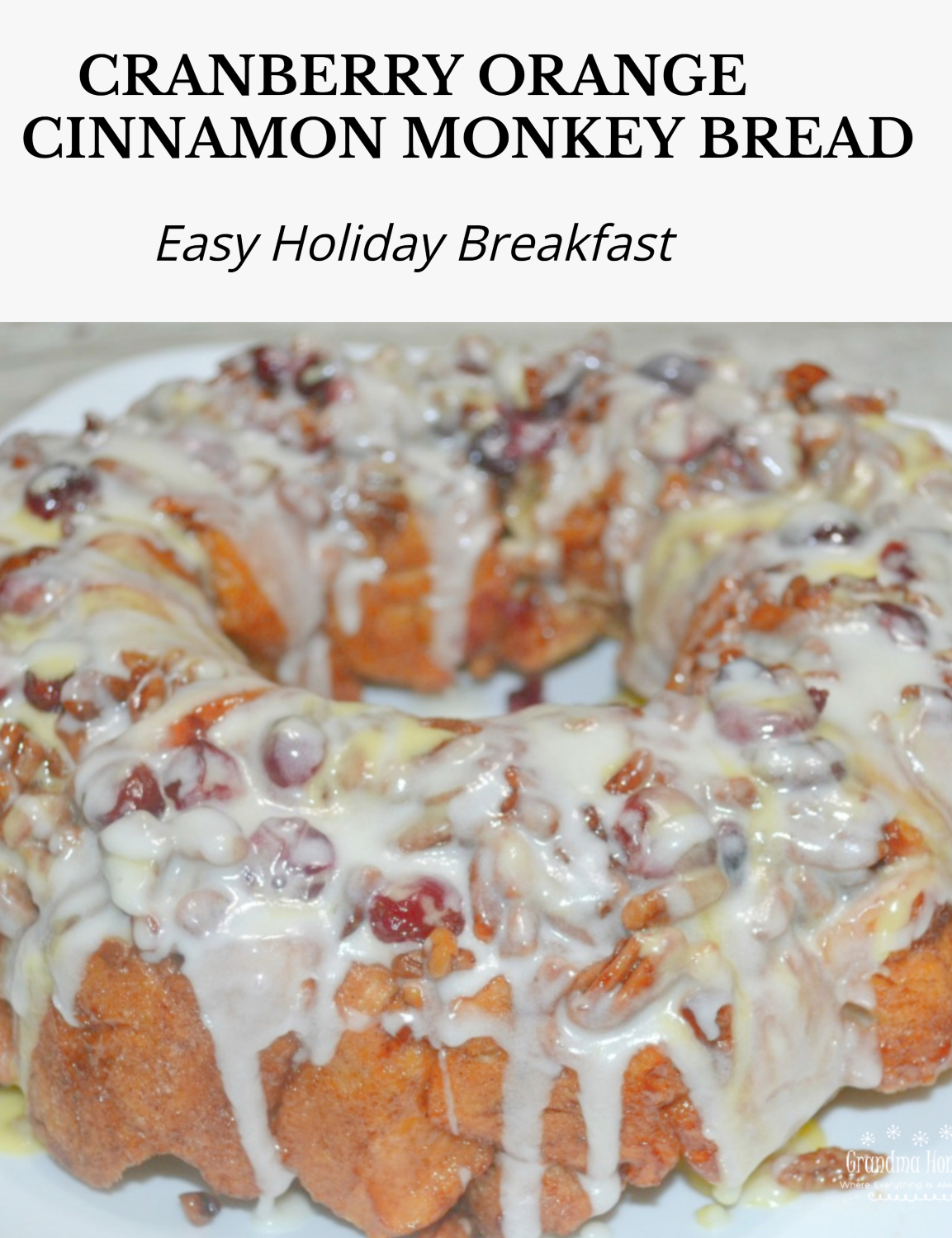 Cranberry Orange Cinnamon Monkey Bread is a baked monkey bread made from cinnamon rolls and orange rolls with icing drizzled on it and topped with cranberries and pecans.
